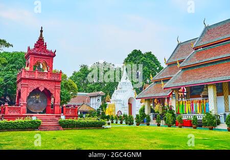 The gong in the scenic building of Ho Rakang bell tower, decorated with moulding, Wat Phra That Hariphunchai Temple, Lamphun, Thailand Stock Photo