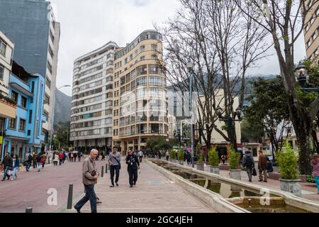 BOGOTA, COLOMBIA - SEPTEMBER 23, 2015: People walk on a pedestrian zone in the center of Bogota. Stock Photo