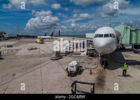 SANTO DOMINGO, DOMINICAN REPUBLIC - SEP 25, 2015: Airplanes at Las Americas International Airport of Santo Domingo. Stock Photo