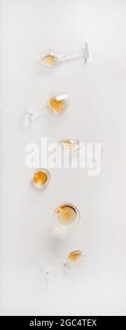 Trendy Orange or Amber wine in different glasses, vertical composition Stock Photo