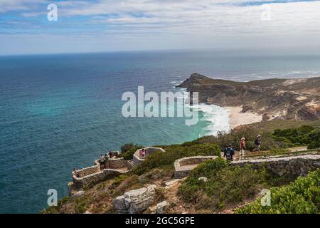 Look out terrace with people at Cape Point with view of Atlantic Ocean, Diaz Beach and Cape of Good Hope in South Africa. Stock Photo