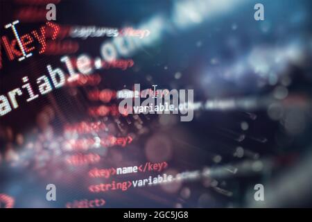 Notebook closeup photo. CSS, JavaScript and HTML usage. Monitor closeup of function source code. Stock Photo