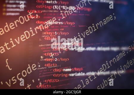 SEO optimization. Modern tech. PHP syntax highlighted. Writing programming functions on laptop. Stock Photo
