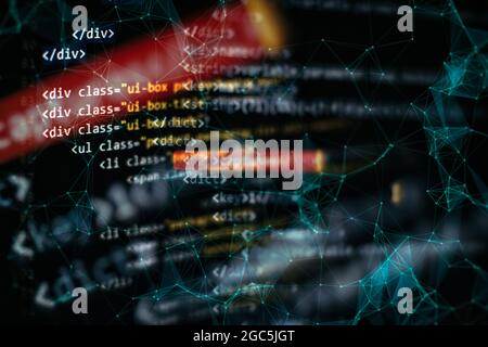 SEO optimization. Modern tech. PHP syntax highlighted. Writing programming functions on laptop. Stock Photo