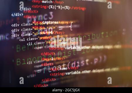 SEO optimization. Modern tech. PHP syntax highlighted. Writing programming functions on laptop. Stock Photo