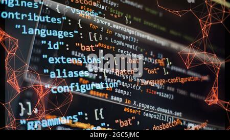 Website development. Developer working on program codes in office. Computer program. Programmer workplace. Programming code. Software source code. Stock Photo