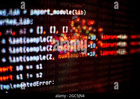 Hacker background, Programmer working in desktop laptop, Blurred screen with selective focus, JS, Closeup cooperating in web specialist apps, Tech sou Stock Photo