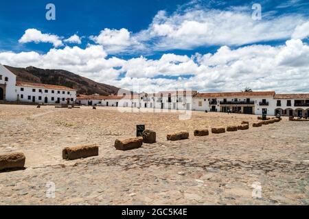 White houses on Plaza Mayor square in colonial town Villa de Leyva, Colombia.