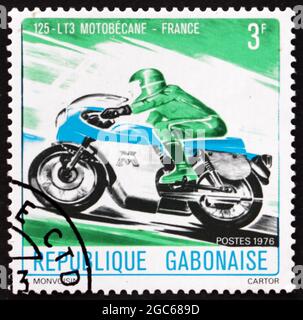 GABON - CIRCA 1976: a stamp printed in the Gabon shows Motorcycle, Motobecane, France, circa 1976 Stock Photo