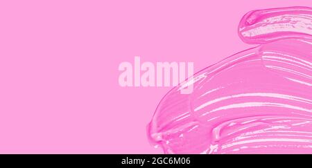 Cream gel red transparent cosmetic sample texture with bubbles on pink background. Virus protection or cosmetics concept Stock Photo