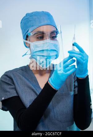 Female doctor in operating theater Stock Photo
