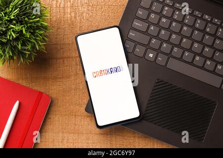 Assam, India - August 6, 2021 : Cashkaro logo on phone screen stock image. Stock Photo