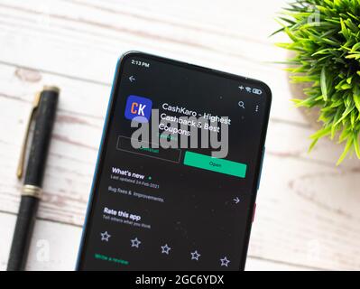 Assam, India - August 6, 2021 : Cashkaro logo on phone screen stock image. Stock Photo