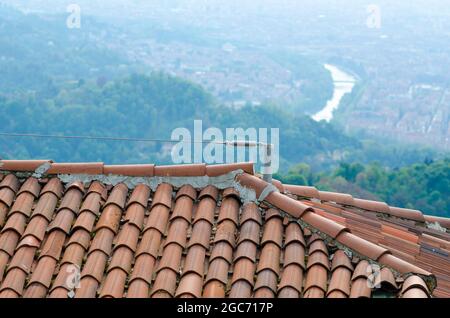 safety on construction sites: roof with lifeline and brick tiles, safety  hook for those who work on the roof, on the upper pitch near the ridge  tiles Stock Photo - Alamy