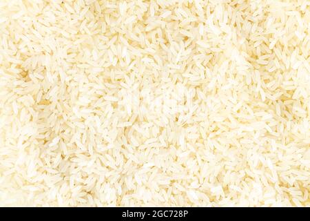 Raw white organic basmati rice, ingredient for cooking asian food