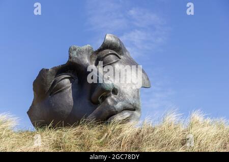 Face sculpture in Scheveningen Stock Photo