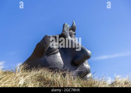 Face sculpture in Scheveningen Stock Photo