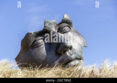 Face sculpture in Scheveningen Stock Photo