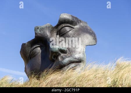 Face sculpture in Scheveningen Stock Photo