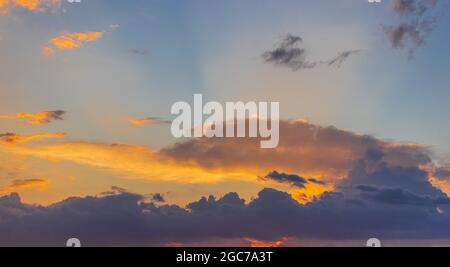 Sky of vibrant red cloudy sunset for sky tool, dramatic background Stock Photo