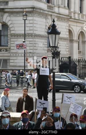 London, UK. 07th Aug, 2021. Downing Street 7 August 2021. Three Gurkha two men one women begin a hunger strike till death to appeal to the British government to match the pension of the British armed forces until the British government adament. Gyanraj Rai, Dhan Bahadur Gurung, Pushpa Ghale Rana are preparing for a hunger strike until they die, until the British government equalizes the pension of the British armed forces. Credit: Picture Capital/Alamy Live News Stock Photo