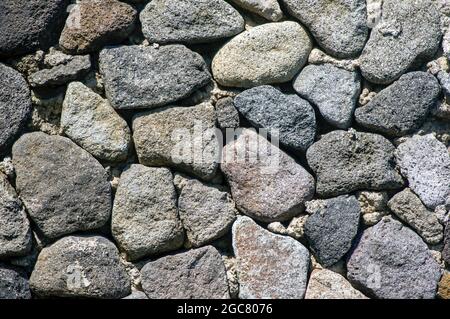 Volcanic stone slabs for natural wallpaper. Natural background. Stock Photo