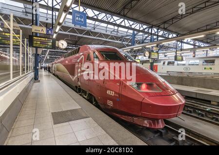 BRUSSELS, BELGIUM - March 12, 2019: International high speed train Thalys arriving in railway station Brussels-South (Bruxelles-Midi or Brussel-Zuid) Stock Photo