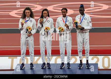 Sydney McLAUGHLIN (USA) and Allyson FELIX (USA) watch their relay ...