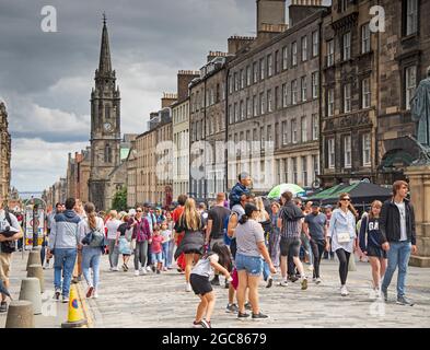 Edinburgh, Scotland, UK. 7th August 2021. A busier day for   second day of Edinburgh Fringe Festival in Royal Mile  Credit: Arch White/Alamy Live News. Stock Photo
