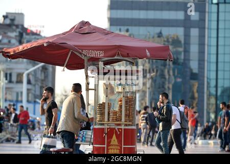 Group portrait of several young guys and one elderly man near stall with  turkish bagel at Taksim in Beyoglu, Istanbul Stock Photo - Alamy