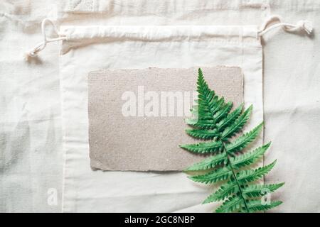 Storage in cotton eco bags and eco paper. Sustainable, ethical, plastic free lifestyle. Top view, flat lay. High quality photo Stock Photo