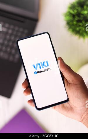 Assam, India - August 6, 2021 : Rakuten Viki logo on phone screen stock image. Stock Photo