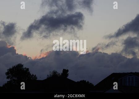 Cloud formations seen on a windy day in summer 2021. Stock Photo