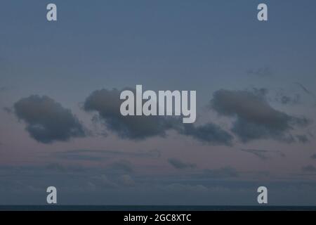 Cloud formations seen on a windy day in summer 2021. Stock Photo