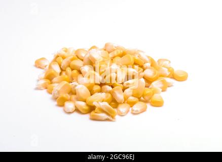 Yellow grain corn isolated on white background, for popcorn Stock Photo