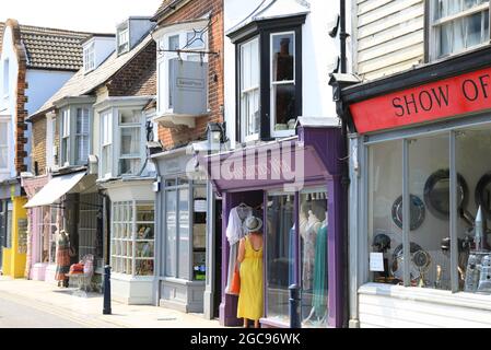 Independent shops on pretty Harbour Street, in coastal Whitstable, in north Kent, UK Stock Photo