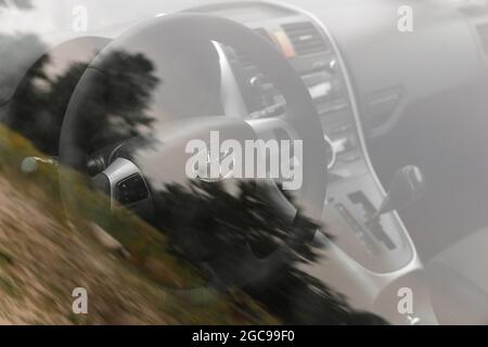 Dnipro, Ukraine - July 30, 2021: Toyota Auris 2012 silver color. Car interior Stock Photo