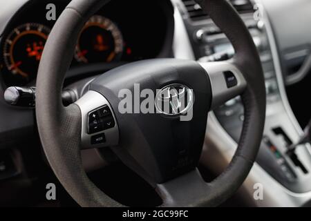 Dnipro, Ukraine - July 30, 2021: Toyota Auris 2012 silver color. Car interior Stock Photo