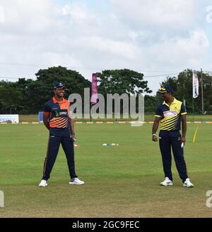 Sri Lanka cricketers Dinesh Chandimal and Seekuge Prasanna at the toss for a match. At the picturesque Army Ordinance cricket grounds. Dombagoda. Sri Lanka.