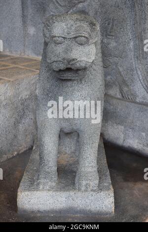A lion carved in cement placed as interior décor at a sports pavilion. Army Ordinance camp Dombagoda. Sri Lanka.