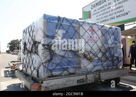 Lusaka, Zambia. 7th Aug, 2021. A batch of China's Sinopharm vaccines arrive at the Kenneth Kaunda International Airport in Lusaka, Zambia, on Aug. 7, 2021. A batch of China's Sinopharm vaccines arrived in Zambia on Saturday to be part of the southern African nation's basket of COVID-19 vaccines. Credit: Zhao Yupeng/Xinhua/Alamy Live News Stock Photo