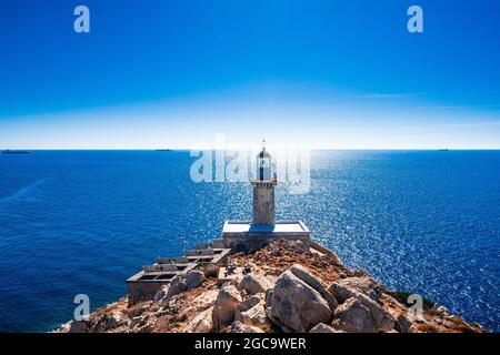 Lighthouse at cape Tainaron lighthouse in Mani Peloponnese, the southernmost point of mainland Greece Stock Photo