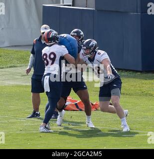 Denver, Colorado, USA. 7th Aug, 2021. Denver Broncos C QUINN MEINERZ looks  on from the field before the start of warm-ups during Training Camp at UC  Health Training Center in Dove Valley