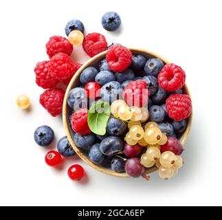 bowl of various fresh berries isolated on white background, top view Stock Photo