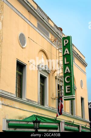 Palace theatre in downtown Hilo, Hawaii is now an arthouse.  This building has a green marque and light tan stucco exterior and was built in 1925. Stock Photo