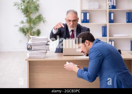 Two employees in dismissal concept Stock Photo