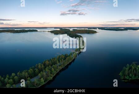 Aerial drone view of Punkaharju nature reserve and its famous ridge road in Savonlinna, Finland. Stock Photo