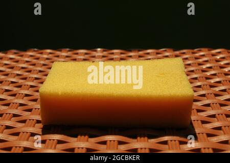 A cleaning sponge on the table Stock Photo