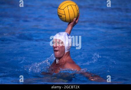 WATER POLO IS A COMPETETIVE TEAM SPORT. SEEN HERE A GAME IN PROGRESS, NSW, AUSTRALIA. Stock Photo