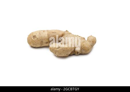 Dried organic fresh ginger on isolated white background Stock Photo